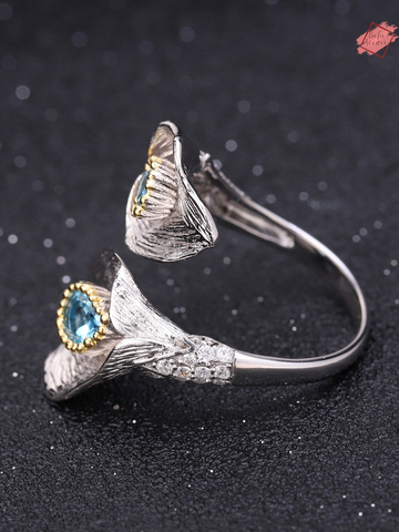 Elevate Your Elegance with the 1.25C Natural Swiss Blue Topaz Calla Lily Leaf Ring